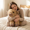 -50 % · OFFRE LIMITÉE · CozyHug™ · Peluche lestée vache Highland