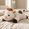 -50 % · OFFRE LIMITÉE · CozyHug™ · Peluche lestée vache Highland