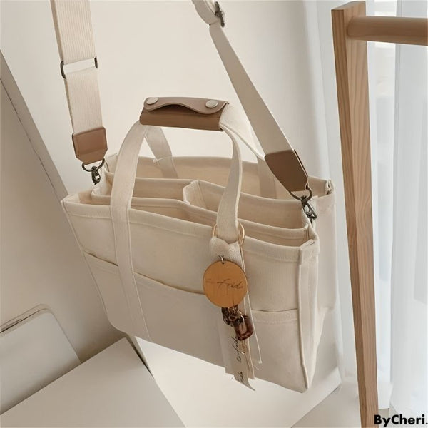 -50 % · OFFRE LIMITÉE · UrbanTote™ · Sac cabas en toile à multiples poches